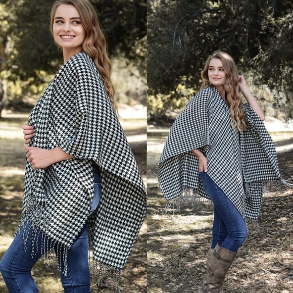 A Classic Houndstooth Poncho And A Winter White Knit Jacket  026 Classic Houndstooth print tassel detail poncho